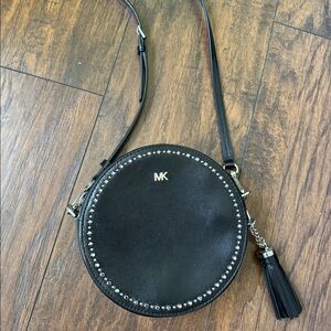 michael kors black purse with tassel